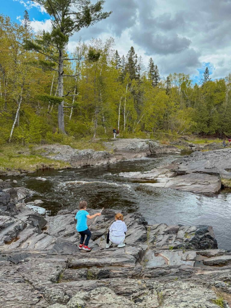 kids playing in the water at jay cooke state park