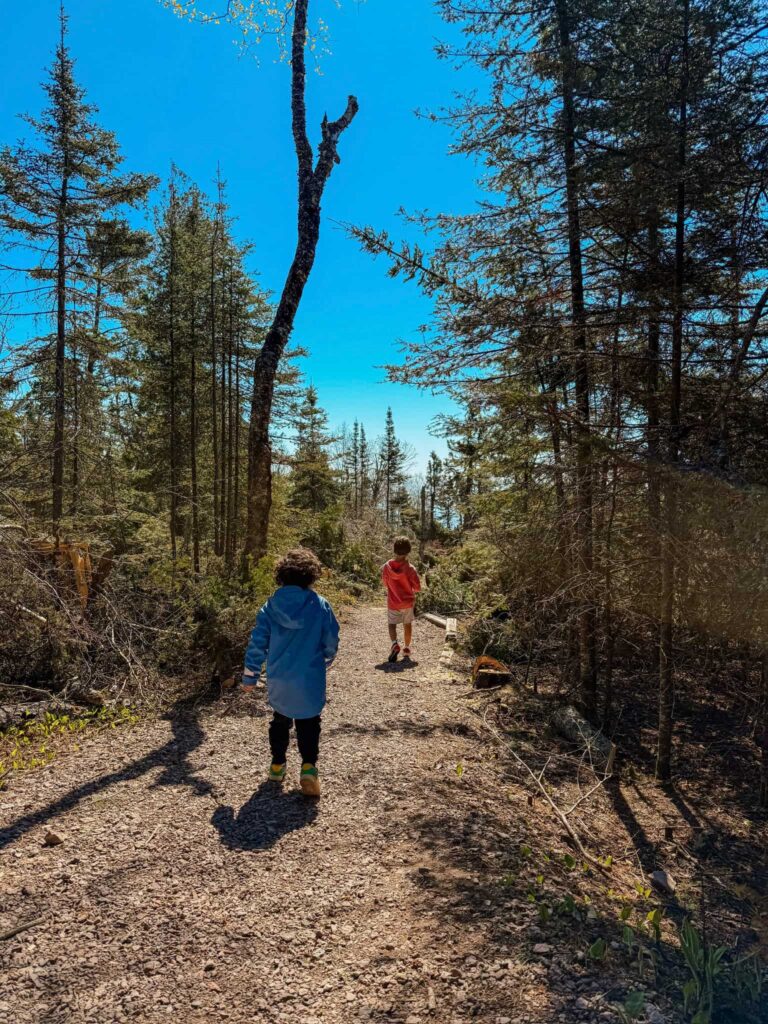 kids running on trail at tettegouche state park