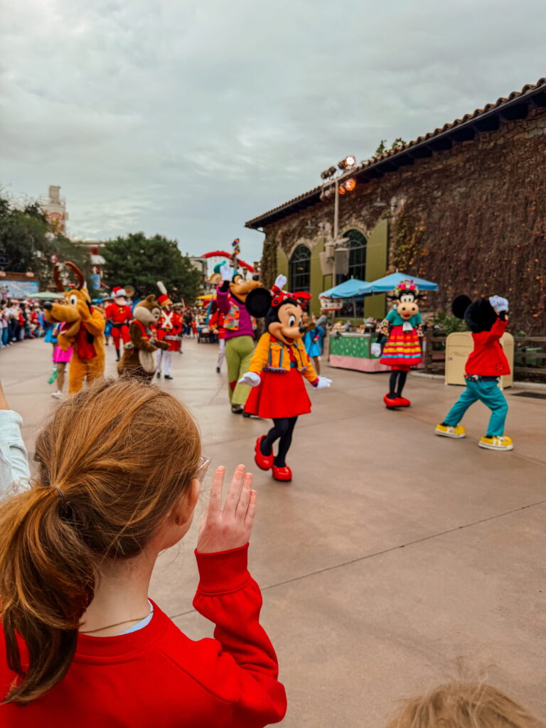 family watching the parade at disneyland