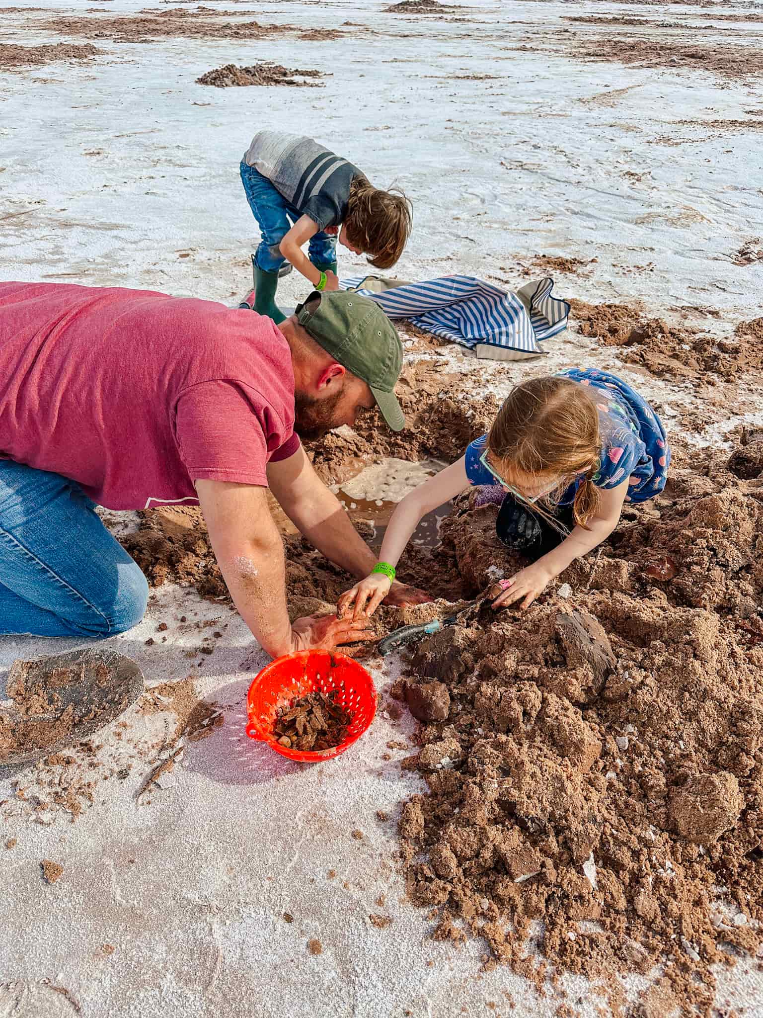 family digging for selenite crystals at great salt plains 