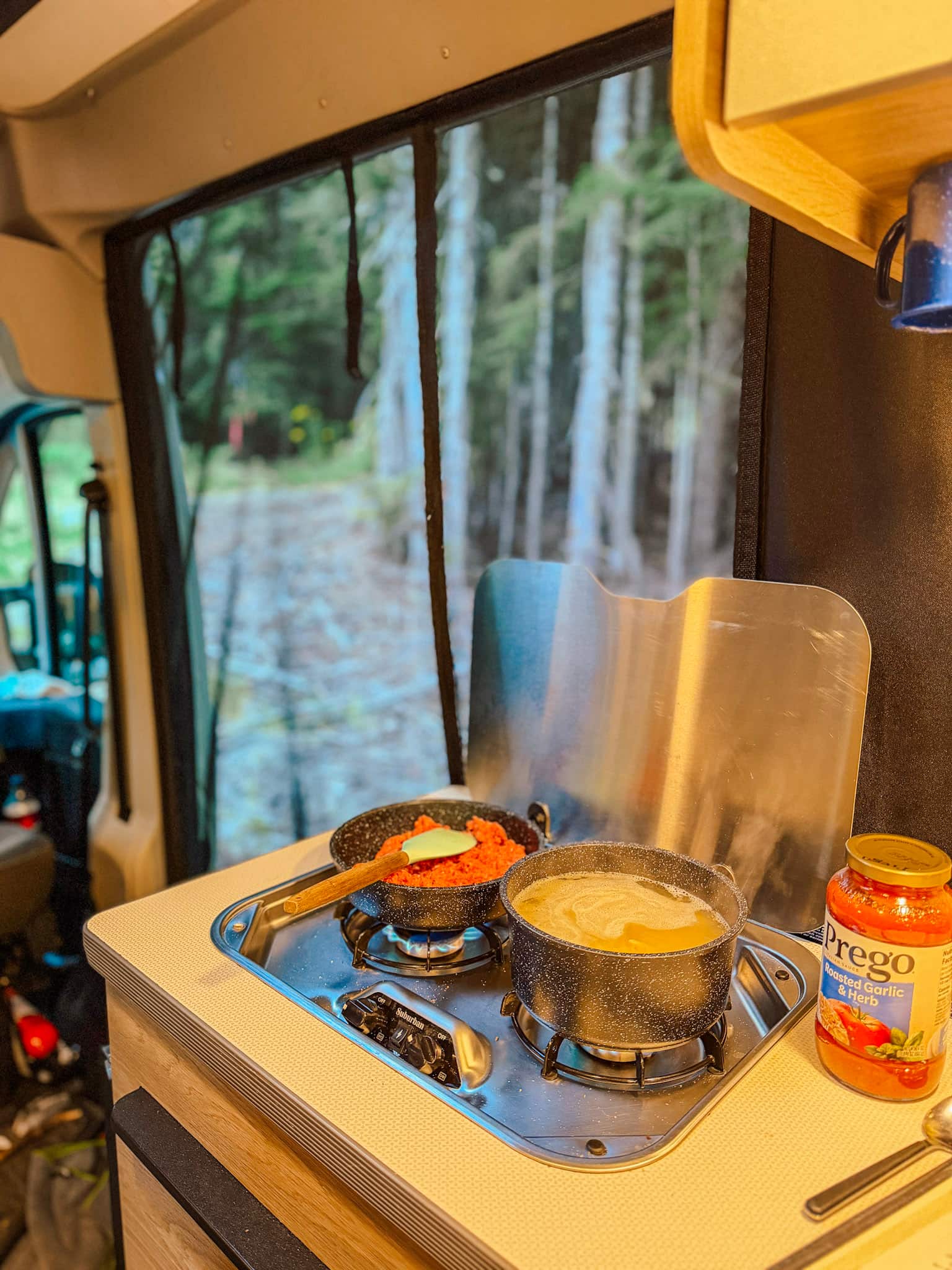 campervan road trip cooking dinner